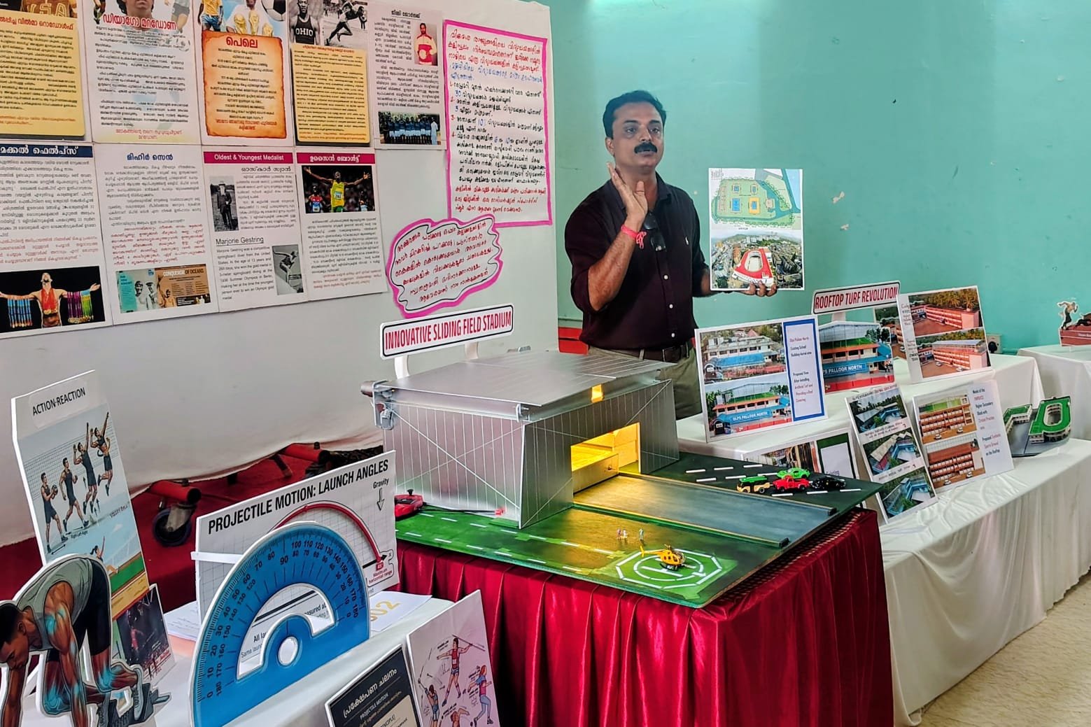 *മാഹി ശാസ്ത്രമേള: കളിക്കളത്തിന് നൂതന ആശയവുമായി കായികാദ്ധ്യാപകൻ*    *കളിക്കളത്തിനായി റൂഫ് ടോപ്പ് ടർഫ് അനിവാര്യം*